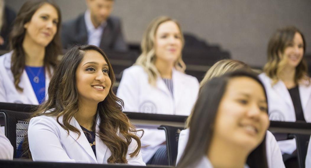 Physician Assistant students celebrate the completion of their program at the White Coat Ceremony.